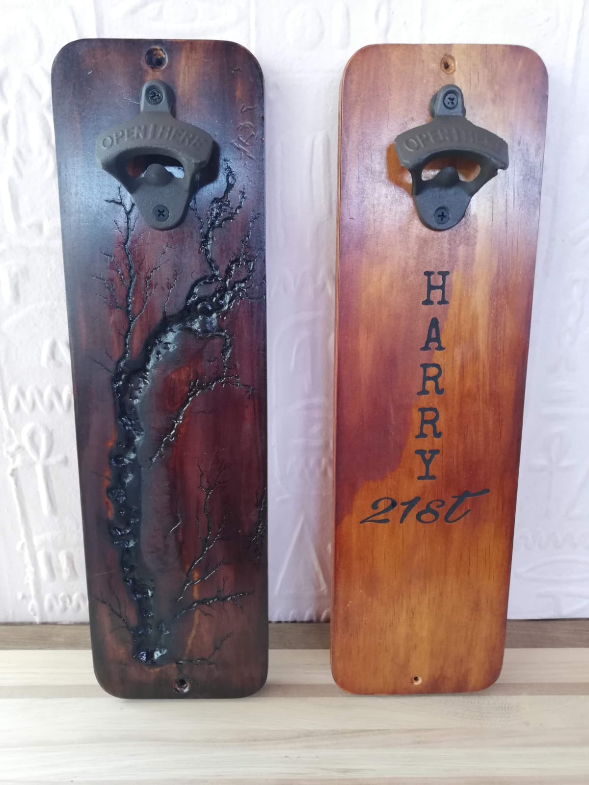 Wall-mounted wooden bottle opener with magnetic catch