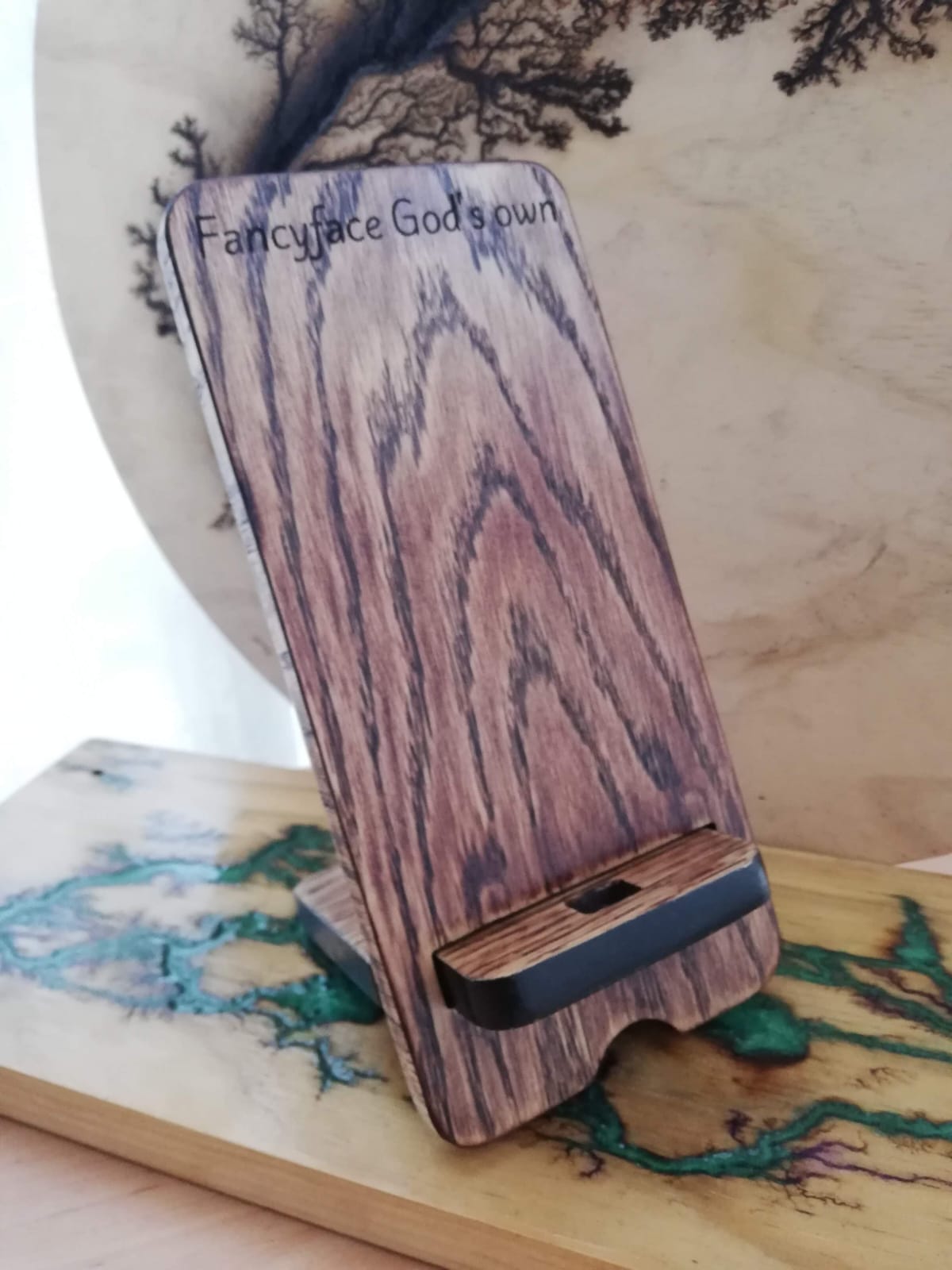 Wooden docking station with phone and watch slots