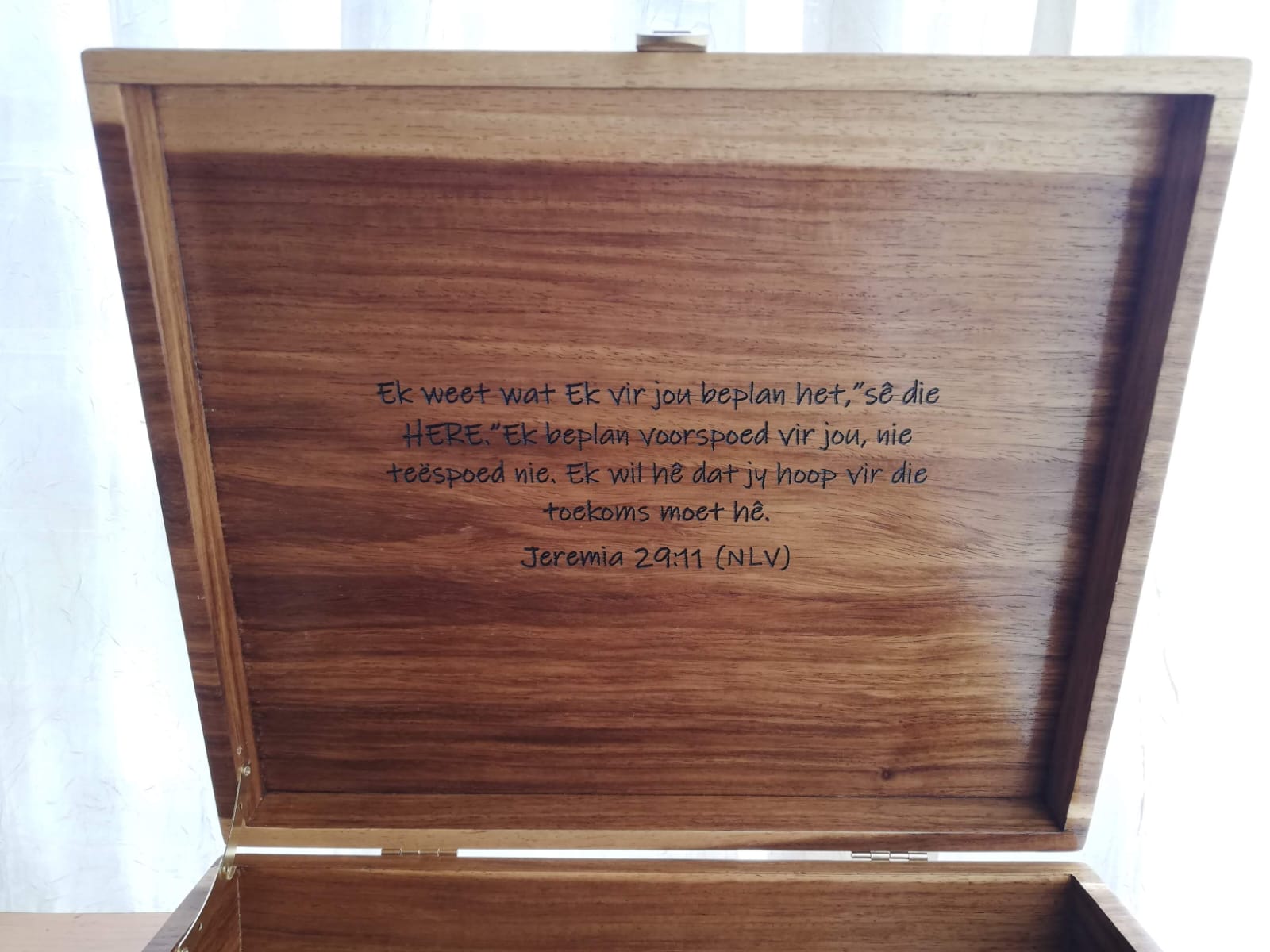 Polished keepsake box for tokens and mementos